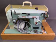 MID-CENTURY NEWHOME CASE SEWING MACHINE with pedal