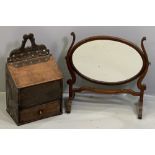 ANTIQUE OAK CANDLE BOX, 43cms H, 26.5cms W, 16cms D and a Georgian mahogany swing toilet mirror,