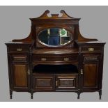 EDWARDIAN MAHOGANY MIRROR BACKED SIDEBOARD - having a bow front and carved detail, 169cms H,