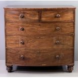 VICTORIAN MAHOGANY CHEST OF DRAWERS with bow front, having two over three long drawers, turned knobs