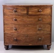 VICTORIAN MAHOGANY CHEST OF DRAWERS with bow front, having two over three long drawers, turned knobs