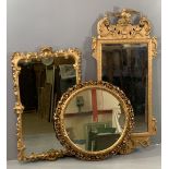 ORNAMENTAL GILT FRAMED WALL MIRRORS (3), 122 x 68cms the largest and 66cms diameter the circular