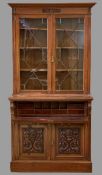 SECRETAIRE BOOKCASE - antique mahogany with two carved doors to the base and glazed astragal pane