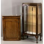 BOW FRONTED CHINA CABINET - single glazed door and inner glass shelves, on ball and claw feet,