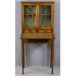 REPRODUCTION MAHOGANY LADY'S DESK with twin upper glazed doors and shelved interior over two small
