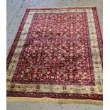 PERSIAN-STYLE 'SILK' RUG, allover red floral scrolling field with tendrils, ivory border, fringe,