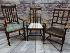 THREE OAK ARMCHAIRS, one with bobbin turned legs, barley-twist stretchers and foliate carved