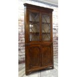 19TH CENTURY OAK STANDING CORNER CABINET, angled cornice with mahogany frieze, astragal glazed