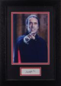 FRAMED AUTOGRAPH OF CHRISTOPHER LEE (Actor), together with promotional photograph, framed with