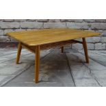 ERCOL GOLDEN ELM COFFEE TABLE, with spindle under tier, blue label, 70 x 99cms