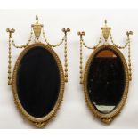 PAIR VICTORIAN NEOCLASSICAL-STYLE GILT GESSO WALL MIRRORS, tops with urns suspending ribbon-tied