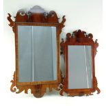 TWO GEORGIAN-STYLE MAHOGANY FRET MIRRORS, each with shaped cornice and corner flanges, 80cms and