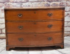 REGENCY MAHOGANY BOW FRONT CHEST, reeded top above three graduated long drawers with ebony