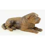 BLACK FOREST CARVED INKSTAND, in the form of a recumbent mastiff hound, hinged lid opening to reveal