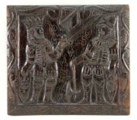 CARVED OAK PANEL, decorated with a King with sword confronting a Knight with axe, both with shields,