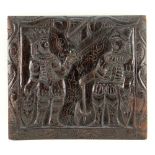 CARVED OAK PANEL, decorated with a King with sword confronting a Knight with axe, both with shields,