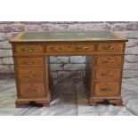 ANTIQUE OAK PEDESTAL DESK, reeded top and uprights, inset leather writing surface, three frieze