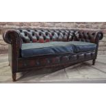 MAROON LEATHER CHESTERFIELD SOFA, with grey cloth over cushion, stained turned beech legs, 183 x