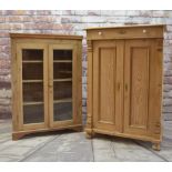 TWO PINE CABINETS, one with glazed doors, the other panelled and with frieze drawer, 133 x 141cms