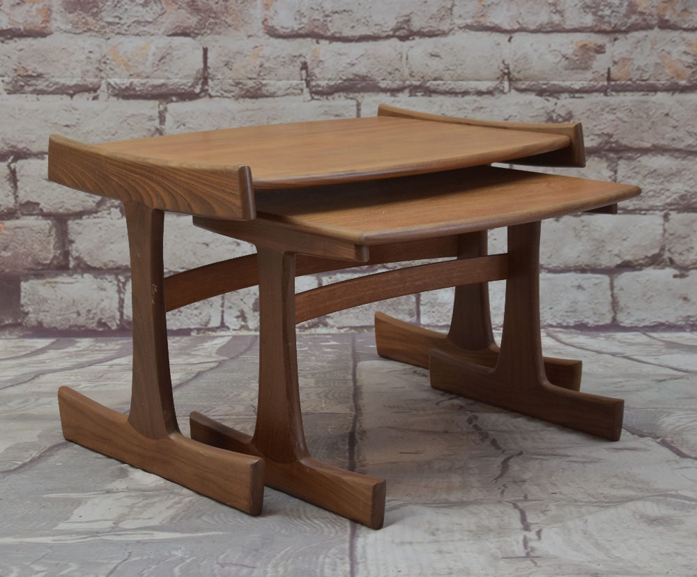 VICTOR B. WILKINS FOR G-PLAN, two teak nesting occasional tables, largest 49h x 74w x 54cms