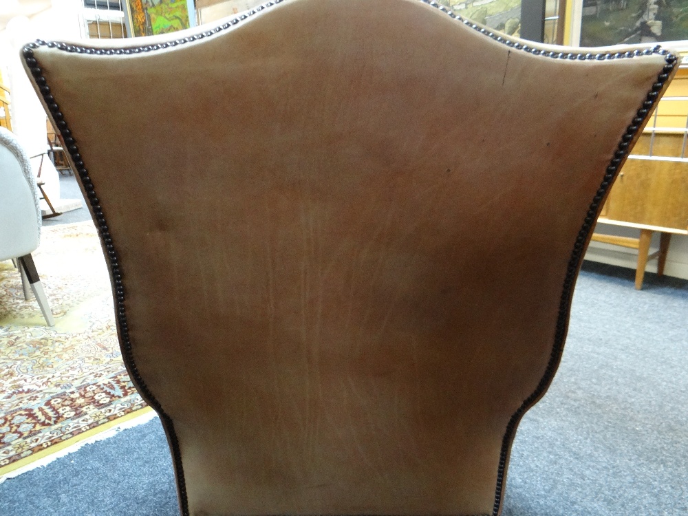 GEORGIAN-STYLE LEATHER WINGBACK ARMCHAIR, close -nailed faded red leather upholstery, claw and - Image 13 of 20