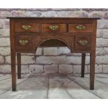 GEORGE III JOINED OAK LOWBOY, boarded top above arrangement of five drawers, under arch, square