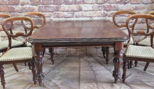 VICTORIAN WALNUT EXTENDING DINING TABLE & CHAIRS, moulded top above gadrooned baluster legs, brass