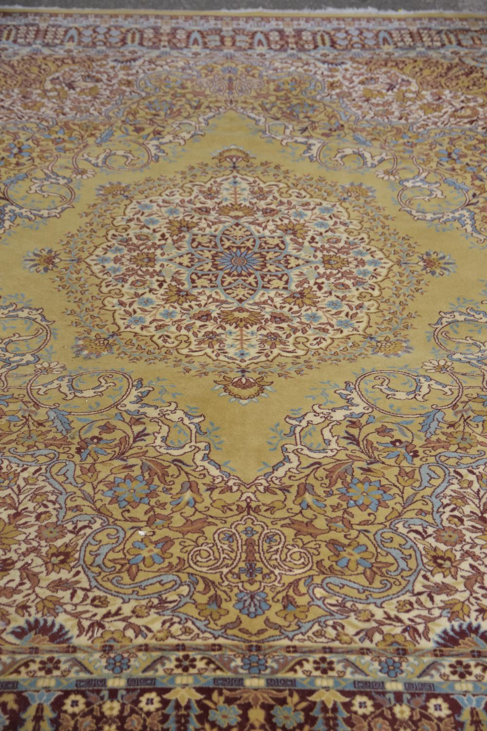LOUIS DE POORTERE ORIENTAL-STYLE CARPET, ivory floral scrolling field with medallion and deep