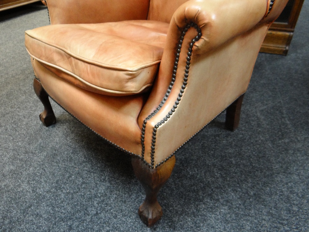 GEORGIAN-STYLE LEATHER WINGBACK ARMCHAIR, close -nailed faded red leather upholstery, claw and - Image 9 of 20