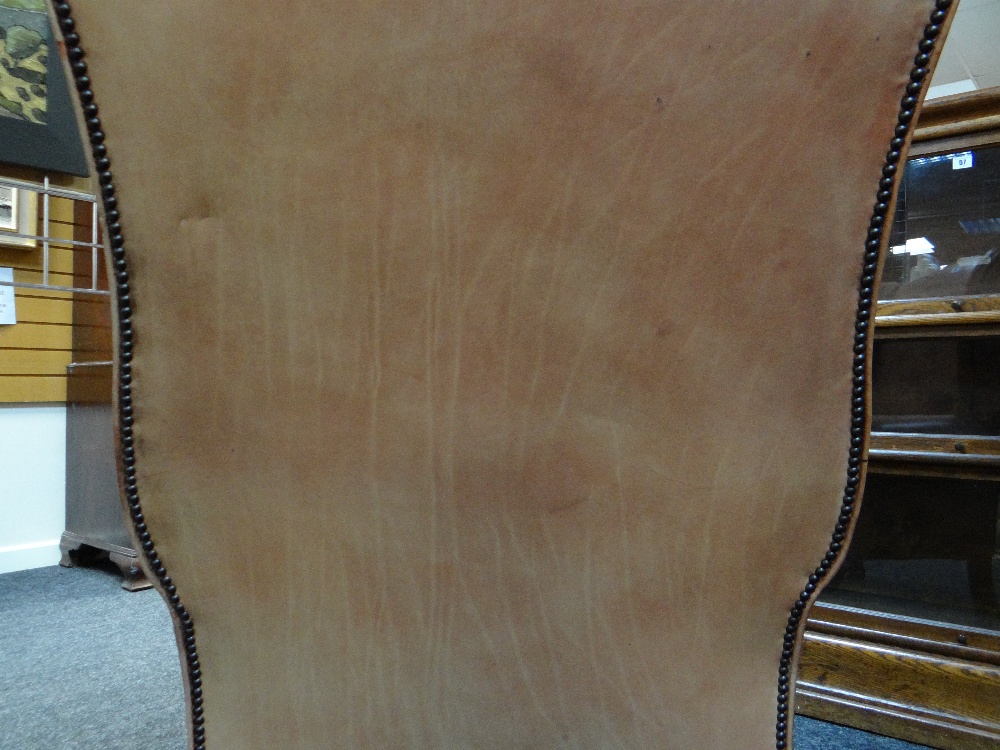 GEORGIAN-STYLE LEATHER WINGBACK ARMCHAIR, close -nailed faded red leather upholstery, claw and - Image 15 of 20