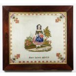VICTORIAN BERLIN WOOLWORK EMBROIDERY depicting a girl holding a doll, foliate spandrels and
