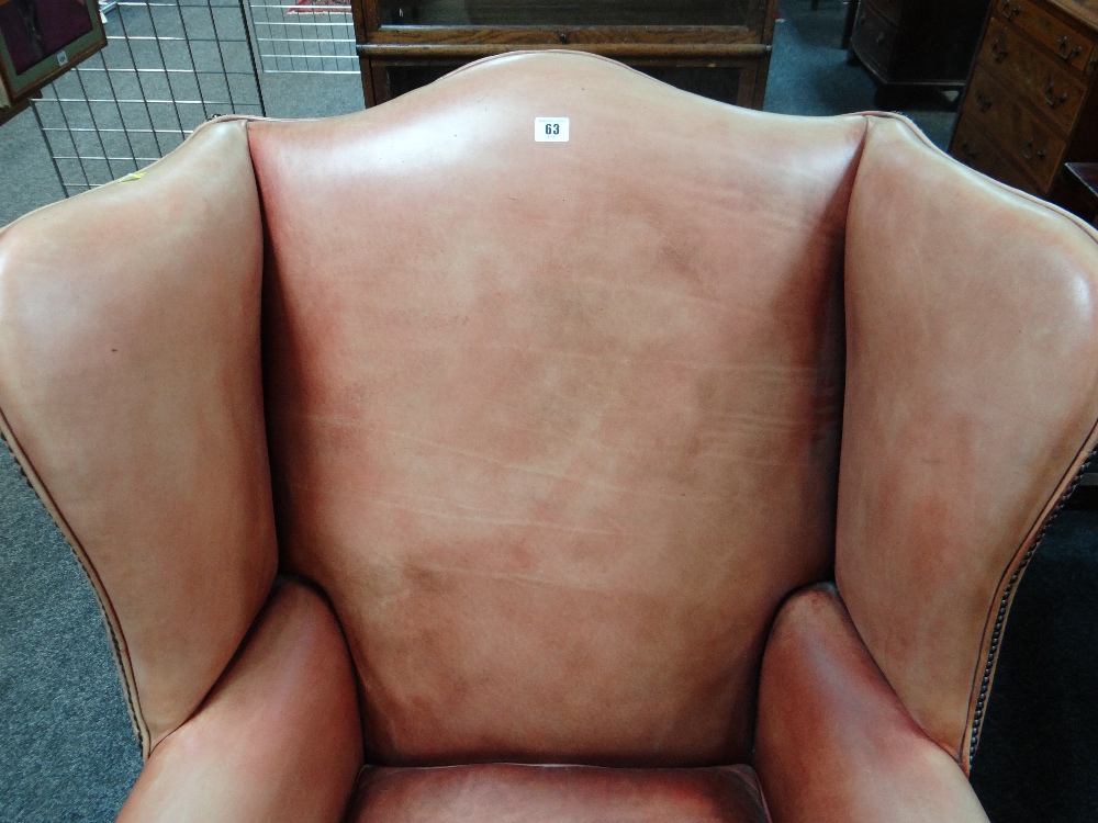 GEORGIAN-STYLE LEATHER WINGBACK ARMCHAIR, close -nailed faded red leather upholstery, claw and - Image 3 of 20