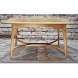 COTSWOLD SCHOOL OAK DINING TABLE, rectangular top with slightly bowed sides and ends, on shaped legs
