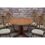 ERCOL CHESTER ELM EXTENDING DINING TABLE & SIX 'SWAN QUAKER' WINDSOR CHAIRS, table with x-column