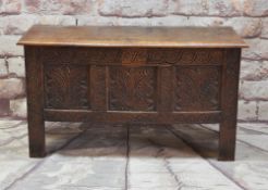 18TH CENTURY OAK COFFER, later carved with foliate, lunette and vitruvian scroll ornament, later