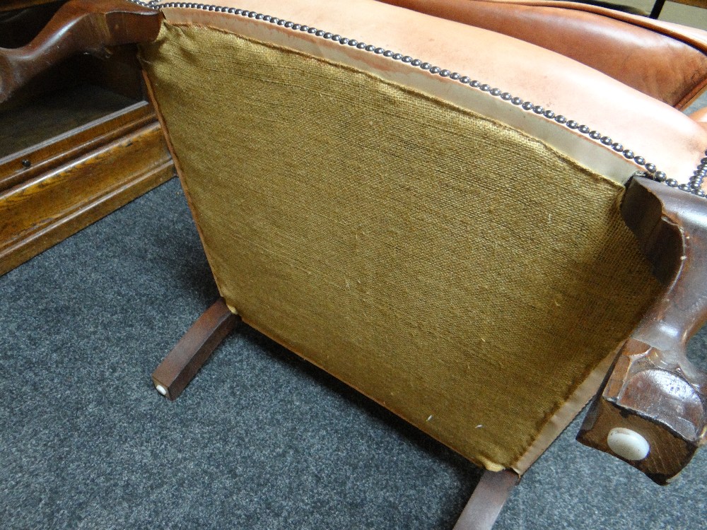 GEORGIAN-STYLE LEATHER WINGBACK ARMCHAIR, close -nailed faded red leather upholstery, claw and - Image 17 of 20