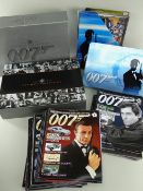 JAMES BOND MOVIE MEMORABILIA: including box of trading cards, associated magazines and an ultimate