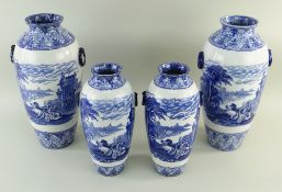 TWO PAIRS OF CAULDON 'BLUE CHARIOTS' BLUE & WHITE' PRINTED VASES, of oviform with fixed ring