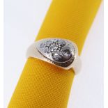 YELLOW & WHITE METAL SEVEN-STONE DIAMOND RING of teardrop design, ring size N, 7.3gms