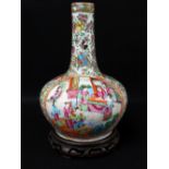 CHINESE CANTON FAMILLE ROSE PORCELAIN BOTTLE VASE, 19th Century, enamelled with opposing oval