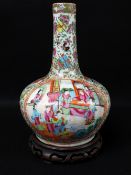 CHINESE CANTON FAMILLE ROSE PORCELAIN BOTTLE VASE, 19th Century, enamelled with opposing oval