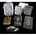 SEVEN NOVELTY VESTA CASES comprising five silver examples, one brass and one plated, including