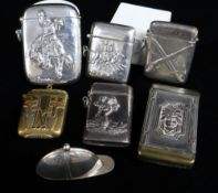 SEVEN NOVELTY VESTA CASES comprising five silver examples, one brass and one plated, including