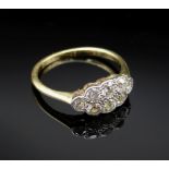18CT GOLD DIAMOND CLUSTER RING, the eight stones totalling 0.6cts approx., ring size J, 2.0gms, in