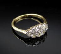 18CT GOLD DIAMOND CLUSTER RING, the eight stones totalling 0.6cts approx., ring size J, 2.0gms, in