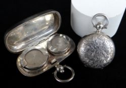 TWO SILVER SOVEREIGN CASES comprising George V silver double sovereign case with presentation