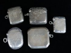FIVE SIMILAR SILVER VESTA CASES, all with some engraving, two of slightly curved form, Birmingham