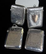 FOUR SIMILAR SILVER VESTA CASES, of rectangular form, all engraved, one with initials, late 19th /