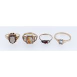 FOUR GOLD GEM SET RINGS comprising three 9ct gold rings and a 14ct gold ring, 11.1gms overall (4)