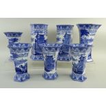 SEVEN CAULDON 'BLUE CHARIOTS' BLUE & WHITE' PRINTED HEXAGONAL SPILL VASES, including five fluted